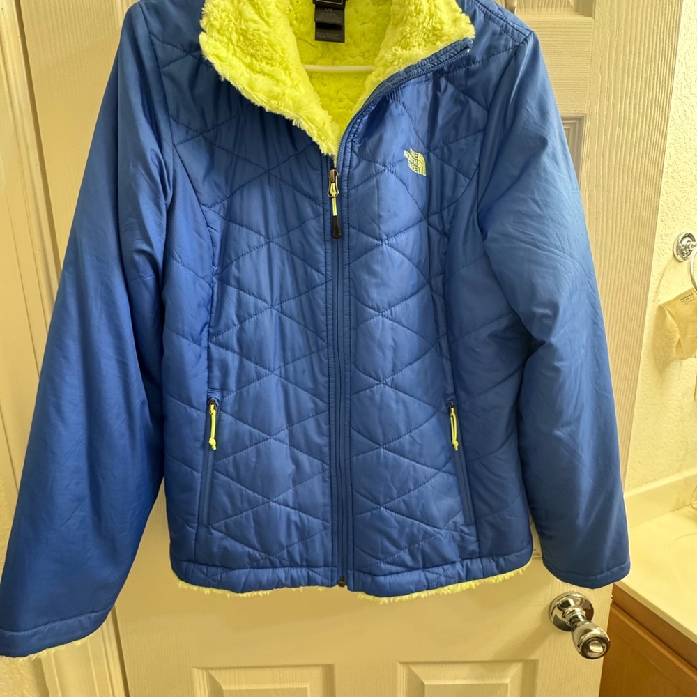 The North Face Blue Puffer Jacket with Yellow Accents